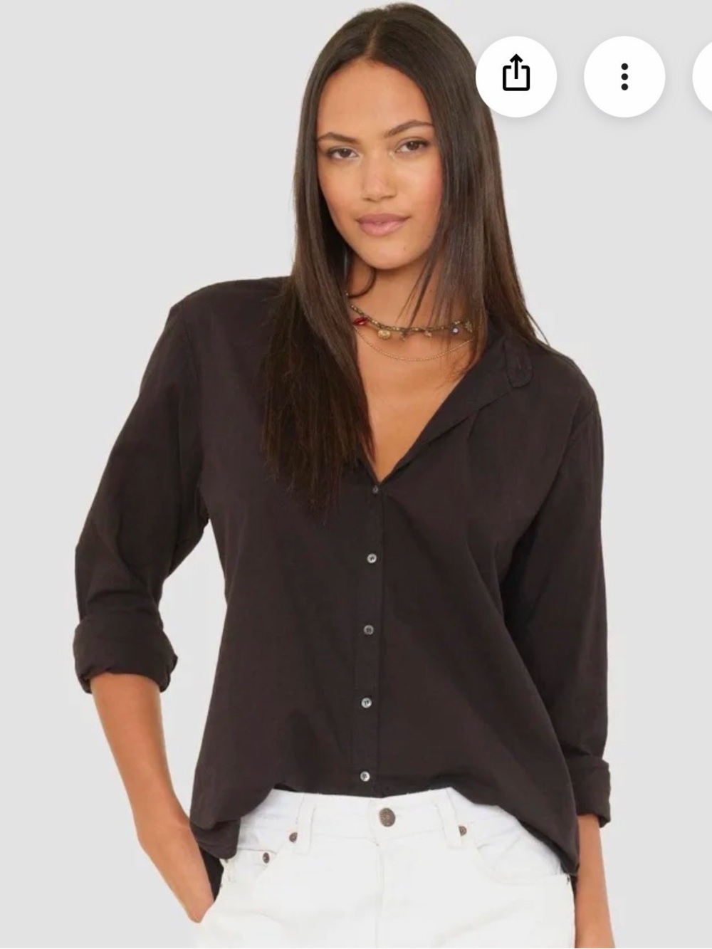 Xirena Beau in black beautiful shirt for occasion.